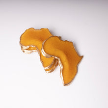 Load image into Gallery viewer, Mini Set of African Shaped Coasters in Sunset and Trimmed in Gold.
