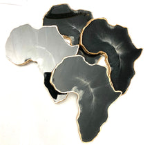 Load image into Gallery viewer, African Shaped Coasters in Black and White with Gold Trim
